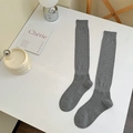 Calcetines altos grises de punto acanalado clásico en estilo minimalista para mujer - Talla única / Gris claro