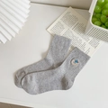 Light gray crew socks with colorful flecks and a cute bear embroidery accent - Gray
