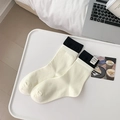 Minimalist cream heart embroidered socks with black ribbed cuffs and label detail - White with Tag