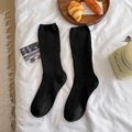 Black Japanese knit slouch socks with textured diamond pattern and ribbed cuffs - One Size / Black