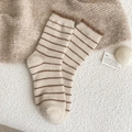 Cozy striped mid-calf fleece socks in cream and brown for winter warmth and comfort - Khaki