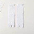 Men's solid white tabi split-toe crew socks in cotton knit with ribbed cuffs - One Size / White