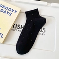 Black knit ankle socks featuring colorful polka dots and high-elastic ribbed cuffs - One Size / Black