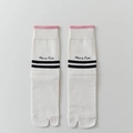 White tabi socks with pink trim and black stripes featuring 'More Fun' text - One Size / White (White Toe)