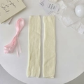 Cream knit leg warmers with pink ribbons featuring a vertical ribbed pattern for a ballet look - One Size / Beige with Pink Ribbon