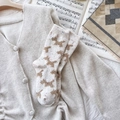 White knit mid-tube socks featuring cute brown puppy motifs and colorful polka dots - One Size / White All-over Dog
