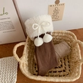 Brown knit leg warmers with faux fur trim, white pom-poms, and elegant bow details - One Size / Coffee