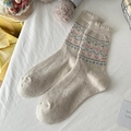 Calze di lana beige con cuori rosa e motivi a onde blu per le vacanze invernali - Taglia unica / Beige con fiocco