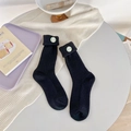 Sweet cream style black crew socks with ribbed knit and cute checkered animal badge - One Size / Black
