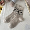 Thick beige knitted wool socks with black reindeer patterns and Nordic style ruffles - Deer Jacquard / Beige
