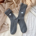 Cozy dark grey wool socks with colorful flecks and a blue bow embroidery detail - One Size / Light Gray