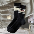 Calze in lana nera a coste con strisce bianche e fiocco rosso scuro in stile preppy - Taglia unica / Nero