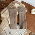 Brown cable knit leg warmers with metal logo tag and cozy winter texture - Light Coffee