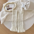 Ballet style knit leg warmers in cream white with ruffled edges and ribbed texture - One Size / White