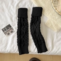 Classic black cable knit leg warmers for women with ribbed cuffs and thick warm texture - One Size / Black