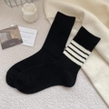 Thick black plush crew socks with white stripes in a cozy winter college style - Black