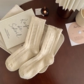 Calze di lana bianco crema con bordi a balze e maglia a coste per il comfort invernale - Beige