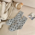 Grey wool crew socks with black heart patterns and ribbed cuffs for women - One Size / Light Gray