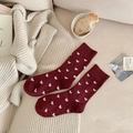 Thick warm dark red mid-calf wool socks featuring white heart patterns and ribbed cuffs - One Size / Red