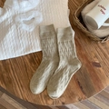 Oatmeal knit mid-calf socks with heart relief pattern in a warm cozy winter style - One Size / Khaki
