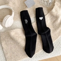 Black rib-knit socks featuring white Follow Your Heart letter and heart embroidery - One Size / Black