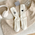 White knit mid-calf socks with heart embroidery and Follow your heart text - One Size / White