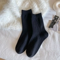 Knee-high cashmere socks in black featuring elegant diamond pattern and ribbed texture - Mid-calf Style / Black