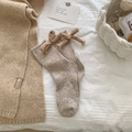 Beigefarbene Wollstricksocken mit süßer Schleife und gerippter Textur für Damen im Winter - Einheitsgröße / Braun