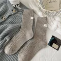 Beige confetti wollen gebreide sokken met ribstructuur en Hello-label voor de winter - Eén maat / koffiekleur