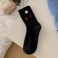 Schwarze Strickstrümpfe mit dekorativen bunten Knöpfen für einen minimalistischen Herbststil - Schwarz