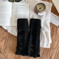 Black ribbed knit leg warmers with cable pattern and decorative buttons on the side - Black
