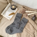 Calze di lana grigie da donna con simpatico motivo a cucciolo per l'autunno - Grigio