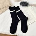 Black ribbed crew socks with white horizontal stripes and delicate ruffle edges - One Size / Black