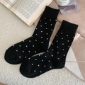 Klassische schwarze Wollsocken mit weißen Punkten und gerippten Bündchen für den Winter - Schwarz
