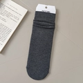 Solid dark grey slouch socks for women in soft knitted cotton with minimalist aesthetic - Dark Gray