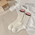 Calze spesse in misto lana con strisce rosa e rosse a contrasto su maglia color crema - Taglia unica / Bianco con bordo rosa