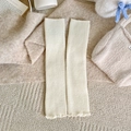 Chic cream white knitted leg warmers with vertical ribbed texture and ruffled edge trim - One Size / Milk White