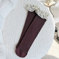 Vintage dark brown ribbed socks with white lace trim detail laid on soft white carpet - One Size / Brown