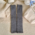 Dark grey knitted leg warmers with delicate ruffle edges in a cozy wool blend style - One Size / Dark Gray