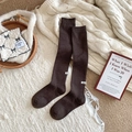 Thick dark brown wool knee high socks with ribbed knit texture and white label - One Size / Coffee