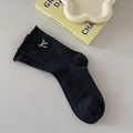 Black crew socks with colorful nep yarn and white bow embroidery in Korean style - One Size / Black