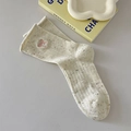 Beige knit mid-calf socks with pink bow embroidery and colorful speckled patterns - One Size / Creamy White