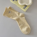 Yellow speckled mid-calf socks with purple bow embroidery and stylish rolled edge - One Size / Yellow