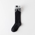 Calcetines altos negros estilo japonés con lazos de malla 3D blancos sobre fondo blanco - Talla única / Negro
