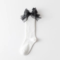 Calcetines altos blancos para niña con un gran lazo decorativo de malla negra - Talla única / Blanco
