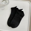 Chaussettes Lolita noires avec nœuds blancs et motifs papillons jacquard tissés - Noir avec Nœud Blanc