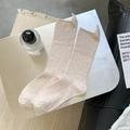 Beige ribbed mid-calf knit socks with SOCKS BY YOU label in a minimalist lifestyle setting - Khaki