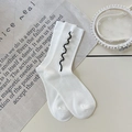 Calze bianche in maglia a coste con finiture a onde nere e decorazioni con perle - Bianco