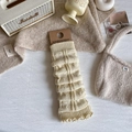Cream knit leg warmers for women with ribbed texture and slouchy design for JK style - Yellow