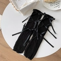 Zwarte gebreide beenwarmers met satijnen strikjes en ribtextuur voor een lieve look - Eén maat / Zwart